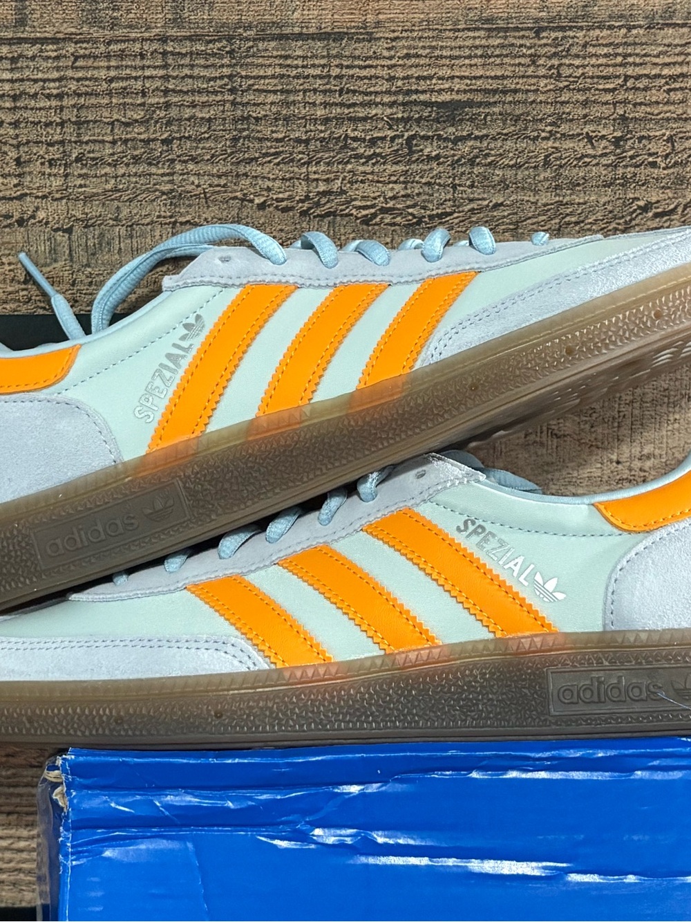 adidas Spezial Light Blue, medium blue & Orange stripes. Men’s 7, women’s 8.